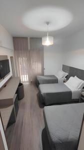 Standard Triple Room room in Hotel Casa Tra Noi