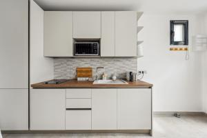 Appartements Le Studio Scandinave - 25min de Paris : photos des chambres