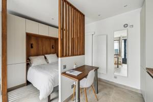 Appartements Le Studio Scandinave - 25min de Paris : photos des chambres