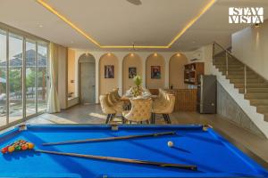 StayVista at Villa Eleve with Bonfire, Pool & Gazebo