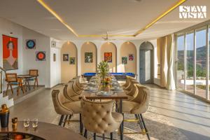 StayVista at Villa Eleve with Bonfire, Pool & Gazebo