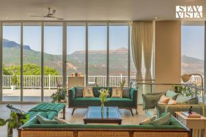 StayVista at Villa Eleve with Bonfire, Pool & Gazebo