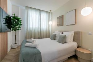 Appartements Le Lusso - L-elegance au coeur de Bergerac : photos des chambres