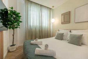 Appartements Le Lusso - L-elegance au coeur de Bergerac : photos des chambres