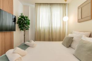 Appartements Le Lusso - L-elegance au coeur de Bergerac : photos des chambres