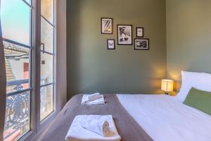 Appartements Le Figuier - Confortable T2 en centre historique : photos des chambres