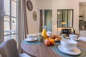 Appartements Le Figuier - Confortable T2 en centre historique : photos des chambres