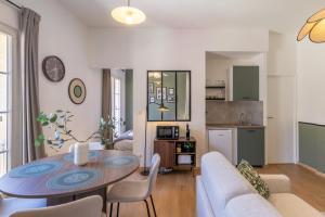 Appartements Le Figuier - Confortable T2 en centre historique : photos des chambres