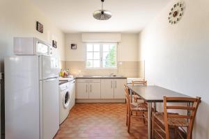 Maisons de vacances Maison au Coeur de Grand Village : photos des chambres