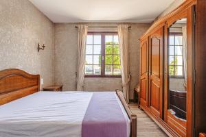 Maisons de vacances Maison au Coeur de Grand Village : photos des chambres