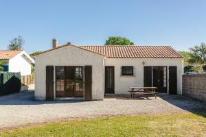 Maisons de vacances Maison au Coeur de Grand Village : photos des chambres