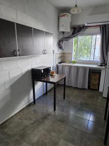 Departamento en Planta baja, centrico, Practico, Estacionamiento D8