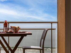 Appartements Duplex Vue Mer by Madame est Servie : photos des chambres
