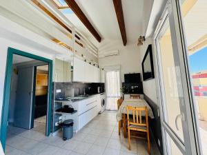 Appartement climatisé, double vue mer et Pic, accès mer et Parking privatif