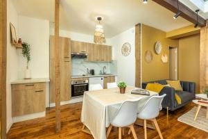 Appartements Le Boho - Charmant T3 avec climatisation et fibre : photos des chambres