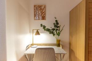 Appartements Le Boho - Charmant T3 avec climatisation et fibre : photos des chambres