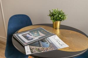 Appartements Le Neo - Studio chic avec sa cour privative et fibre : photos des chambres