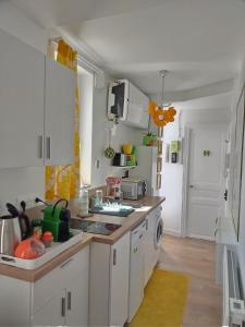 Appartements Le vintage, 10 min de Disney et 30 min de Paris - 50 m gare : photos des chambres