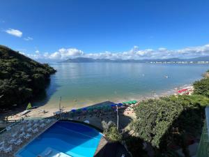 Maravilhoso Apto Beira-Mar Prainha, Caraguatatuba com Piscina e Sauna