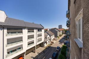 City Comfort - Apartmán pri Hlavnej stanici s výhľadom, parkovanie