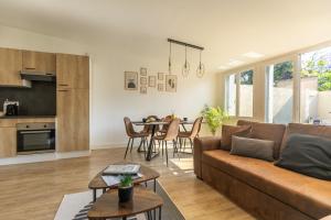 Appartements Le Patio - Spacieux T3 avec climatisation et jardin privatif : photos des chambres