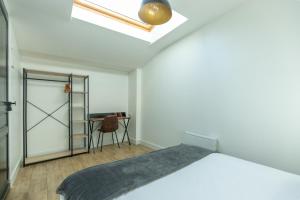 Appartements Le Patio - Spacieux T3 avec climatisation et jardin privatif : photos des chambres