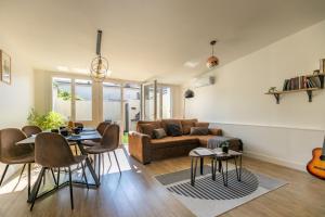 Appartements Le Patio - Spacieux T3 avec climatisation et jardin privatif : photos des chambres
