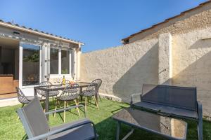Appartements Le Patio - Spacieux T3 avec climatisation et jardin privatif : photos des chambres