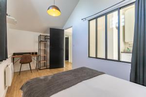 Appartements Le Patio - Spacieux T3 avec climatisation et jardin privatif : photos des chambres