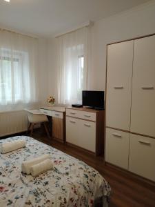 Kaptárkő Apartmanház
