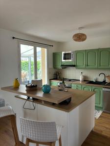 Maisons de vacances Les Mimosas - Jardin clos : photos des chambres
