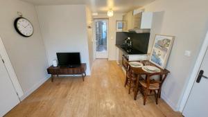 Appartements Le Moulin : photos des chambres