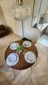 Appartements Les Roses : photos des chambres