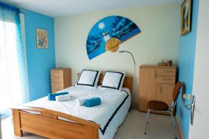 Appartements La Framboisine Gourmande Rez-de-jardin calme et lumineux : photos des chambres