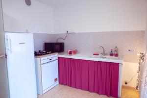 Appartements La Framboisine Gourmande Rez-de-jardin calme et lumineux : photos des chambres