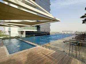 Damac Hills Carson A Monthly Stay - Pay 28, Stay 30
