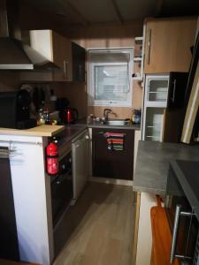 Chalets Chalet accueillant avec vue sur le lac : photos des chambres