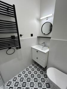 Appartements Le Nid de la Grotte : photos des chambres