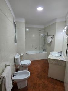 Double or Twin Room (2 Adults + 1 Child) room in Hotel Monopol