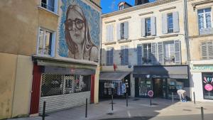 Appartements Le Chic en Ville Centre historique, climatise, wifi, Parking sous-sol inclus : photos des chambres