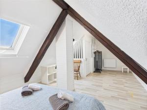 Appartements Cocon Jaune - Duplex 2e etage prox centre Mulhouse : photos des chambres