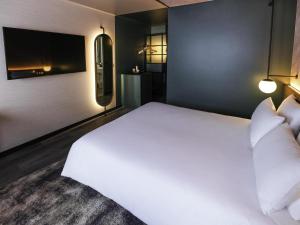 Hotels Novotel Paris Suresnes Longchamp : photos des chambres
