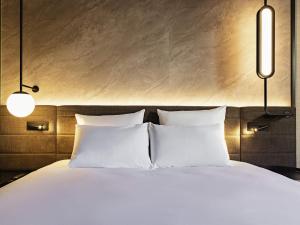 Hotels Novotel Paris Suresnes Longchamp : photos des chambres