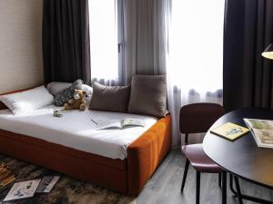 Hotels Novotel Paris Suresnes Longchamp : photos des chambres