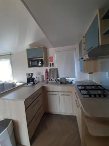 Campings MOBIL HOME Rose : photos des chambres