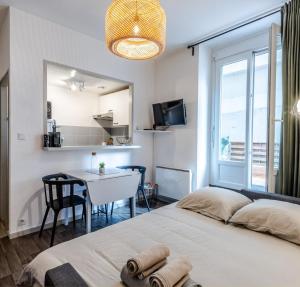 Appartements T2 centre ville, 150m du lac, parking - Thermes : photos des chambres