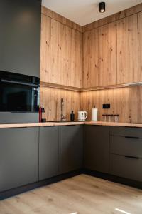 K&M Apartments Tauron Arena, Lema