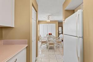 Direct oceanfront corner condo with spacious balcony and heated beachfront pool