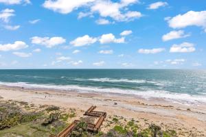 Direct oceanfront corner condo with spacious balcony and heated beachfront pool