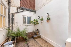 SG, Knightsbridge Residence with Garden Terrace by Harrods